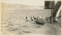 Image of Eskimos [Inuit] coming aboard